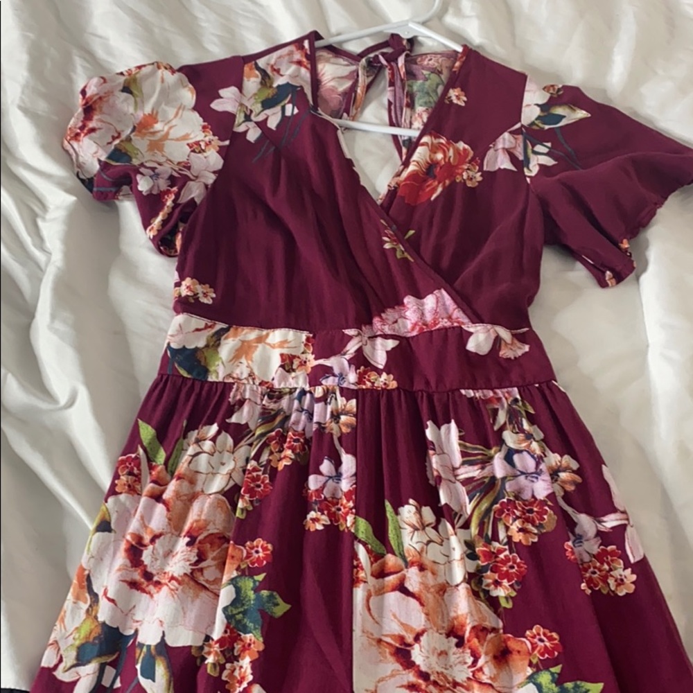 Cute burgundy floral jumpsuit.